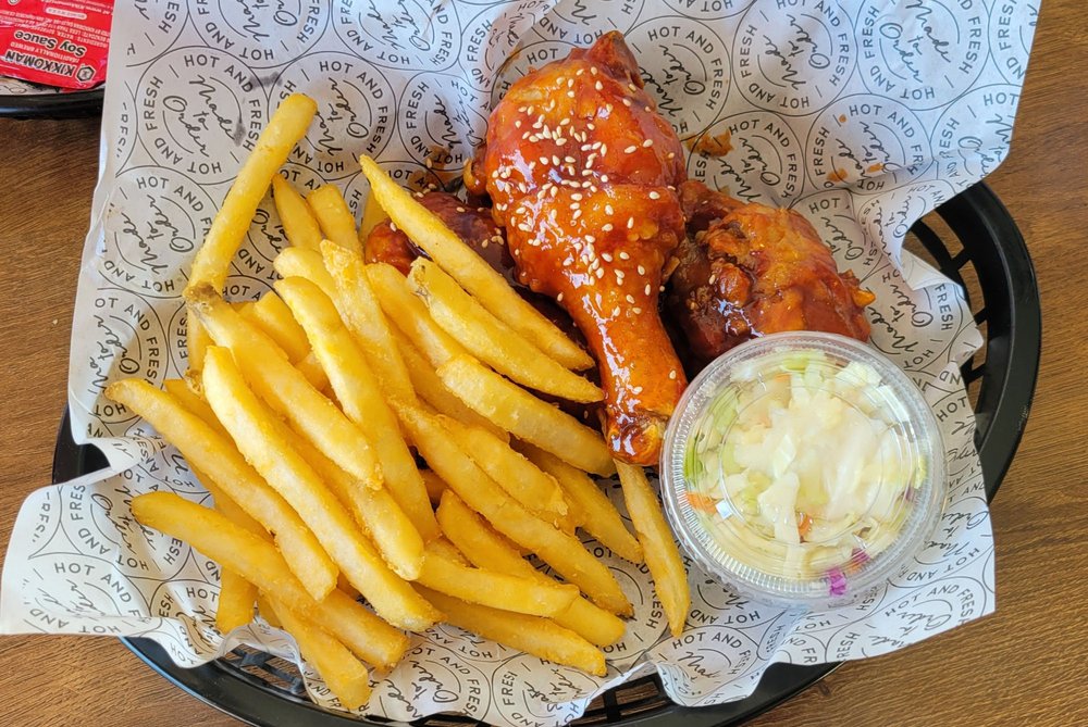Glazed drumsticks with fries and coleslaw